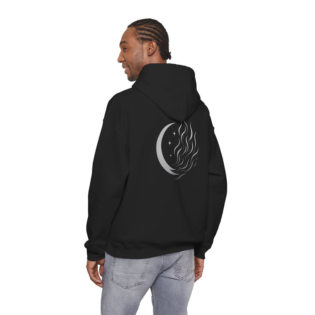 Person wearing a black hoodie with a moon and star design on the back, standing against a white background.