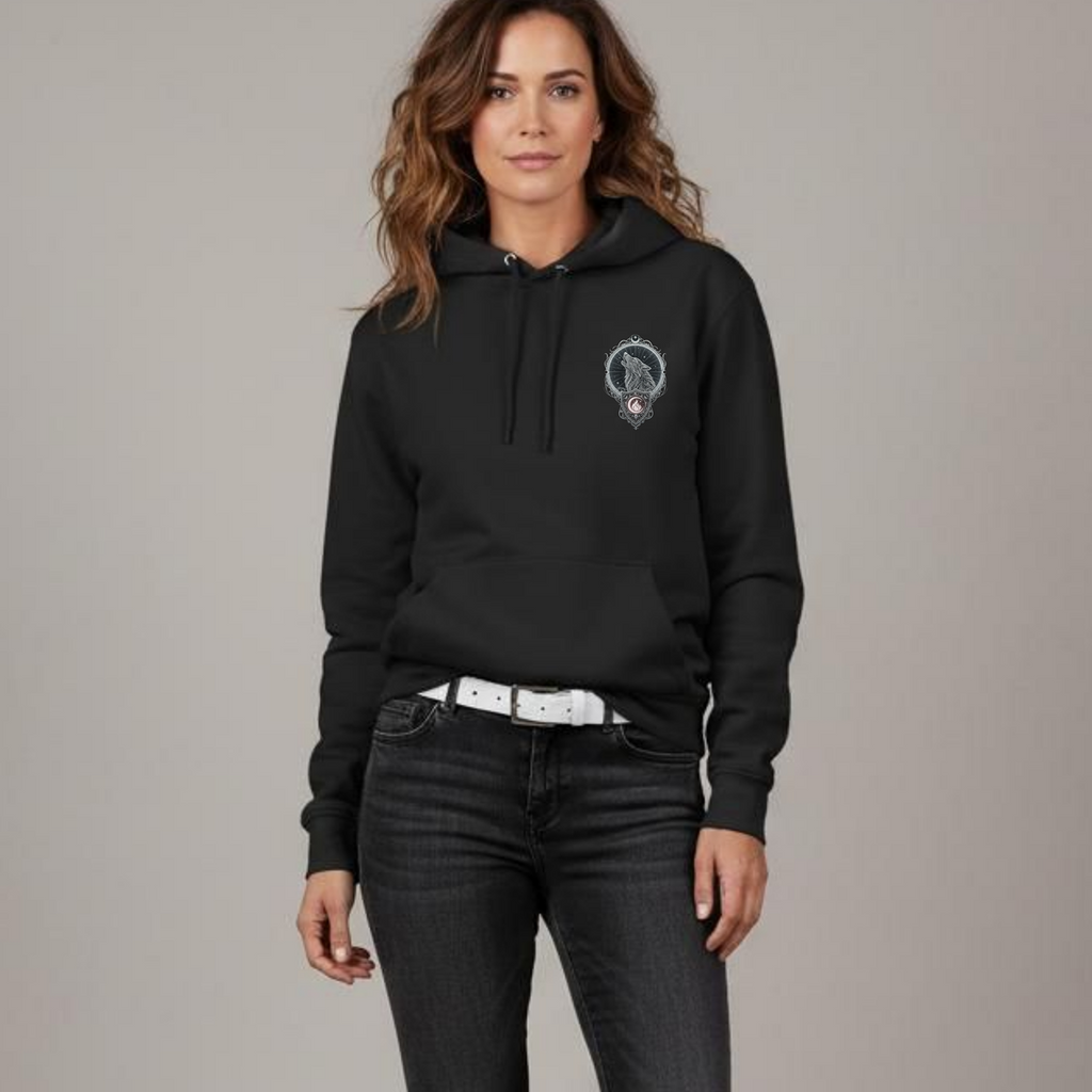 Woman wearing a black hoodie with a logo on a gray background