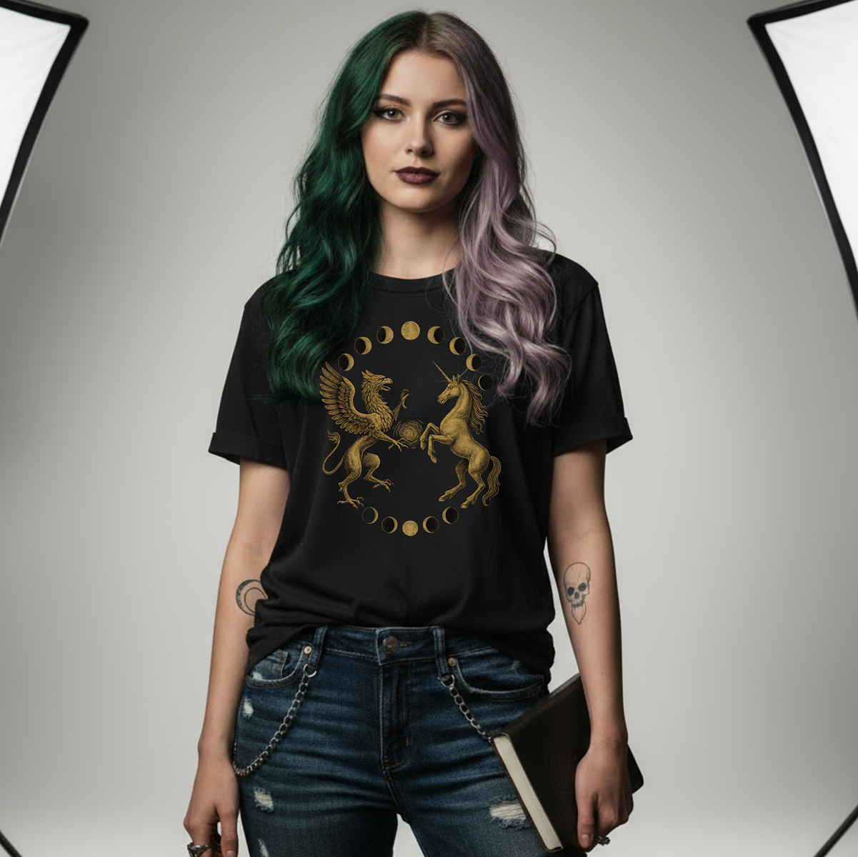 Person wearing a black t-shirt with a gold graphic design on a gray background