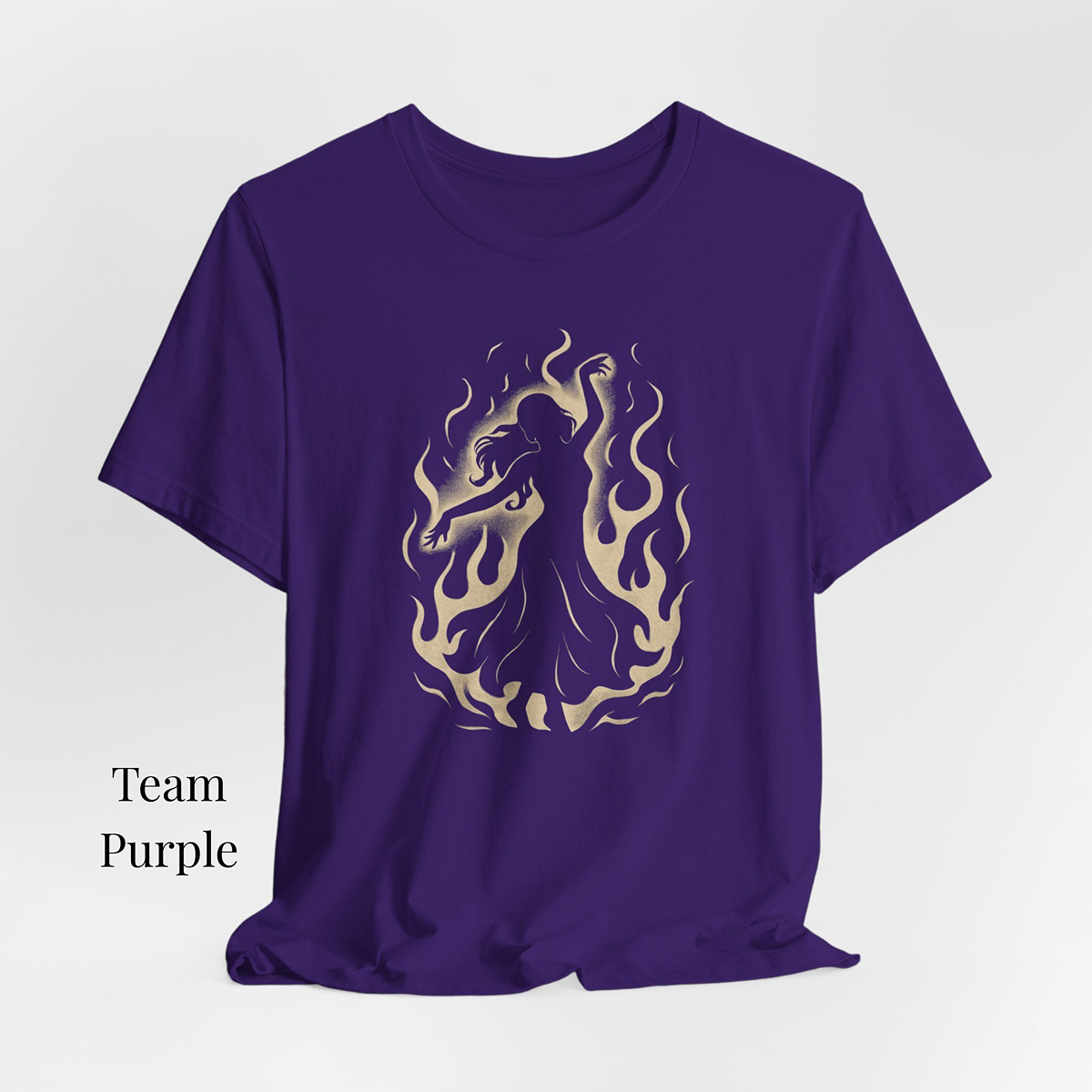 Black unisex t-shirt with minimalist crimson and white shadow flame silhouette dancer graphic – “Spin in the Dark” official merch by The Bela Vibe