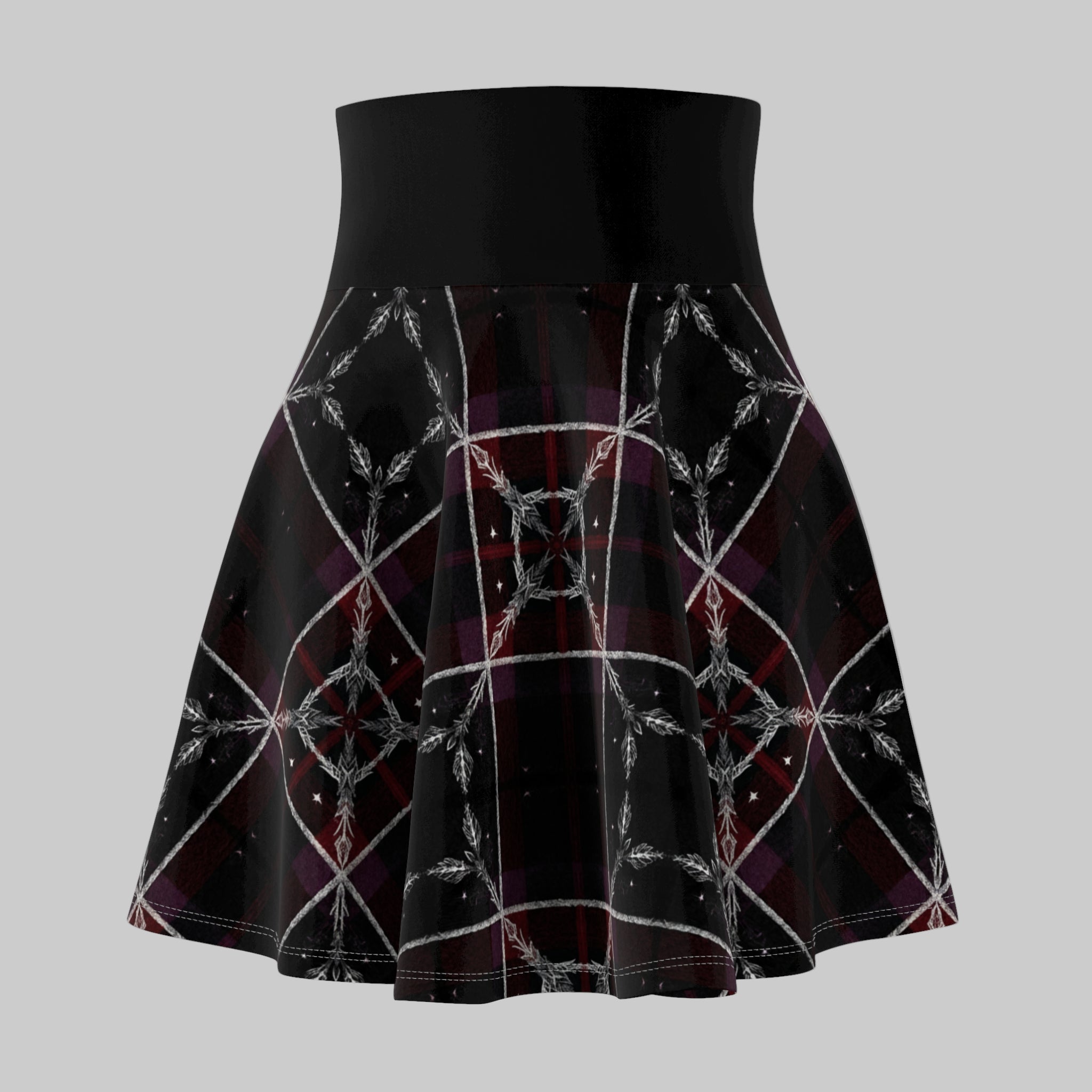 Black skirt with geometric pattern on a white background