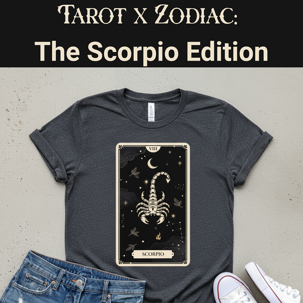 Gray t-shirt with Scorpio tarot card design on a concrete surface with jeans and shoes.